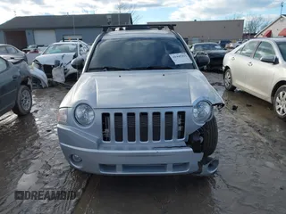 2010 Jeep Compass Sport with VIN 1J4NF4FB3AD589361, listed as a IAAI auction lot 41449412 with 127,807 mi miles. Bid and sale history available at carsss.com. Image 11.