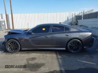 2019 Dodge Charger Scat Pack with VIN 2C3CDXGJ7KH588717, listed as a IAAI auction lot 41694673 with Not Provided miles and . Bid and sale history available at DreamBid. Image 13.