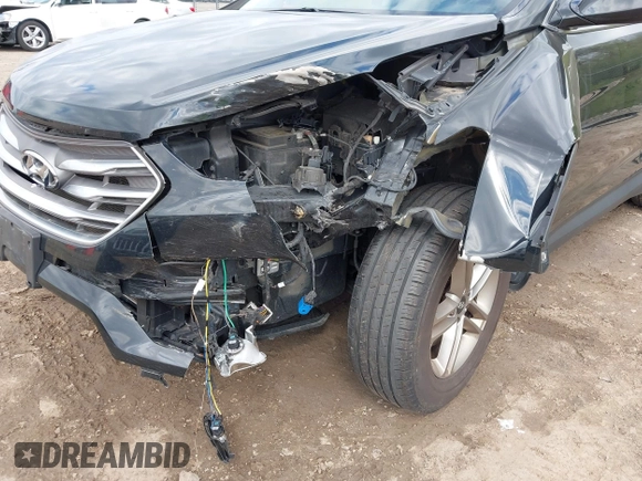 2018 Hyundai Santa Fe 2.4L z VIN 5NMZUDLB2JH058032, wystawiony jako IAAI lot #42206116 z przebiegiem 138 688 mil mil oraz . Historia ofert i sprzedaży dostępna na DreamBid. Obrazek 6.