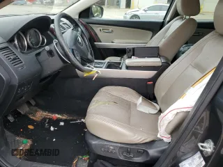 2014 Mazda CX-9 Grand Touring z VIN JM3TB2DA2E0432416, wystawiony jako Copart lot #51324875 z przebiegiem 201 404 mil mil oraz Szkoda całkowita • Salvage title. Historia ofert i sprzedaży dostępna na DreamBid. Obrazek 7.