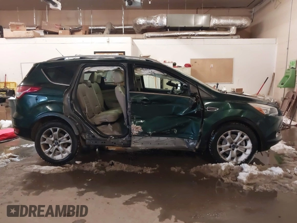 2014 Ford Escape Titanium with VIN 1FMCU9J93EUB95638, listed as a IAAI auction lot 41481089 with 182,258 mi miles. Bid and sale history available at carsss.com. Image 14.