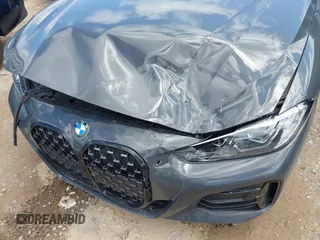 2021 BMW 4 Series M440i with VIN WBA53AT05MCG89665, listed as a IAAI auction lot 42319456 with Not provided miles and . Bid and sale history available at DreamBid. Image 6.