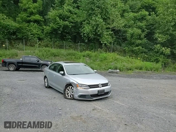 2013 Volkswagen Jetta SE z VIN 3VWDP7AJXDM296643, wystawiony jako Copart lot #60992095 z przebiegiem 159 637 mil mil oraz Szkoda całkowita • Salvage title. Historia ofert i sprzedaży dostępna na DreamBid. Obrazek 13.