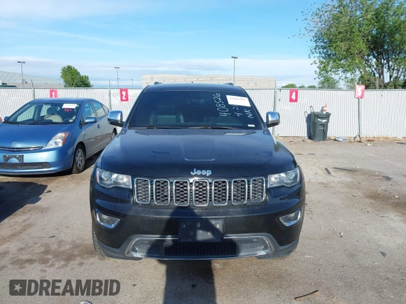 2018 Jeep Grand Cherokee Limited with VIN 1C4RJFBT7JC408526, listed as a IAAI auction lot 42103419 with 103,873 mi miles and . Bid and sale history available at DreamBid. Image 11.