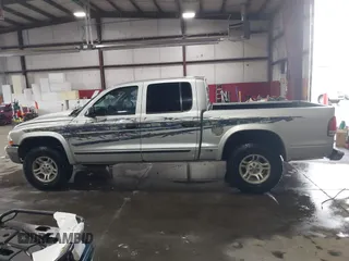 2004 Dodge Dakota SLT with VIN 1D7HG48N64S523528, listed as a IAAI auction lot 41199575 with 261,239 mi miles. Bid and sale history available at carsss.com. Image 14.