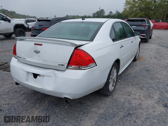 2013 Chevrolet Impala LTZ with VIN 2G1WC5E39D1202260, listed as a IAAI auction lot 41908155 with 210,193 mi miles and . Bid and sale history available at DreamBid. Image 4.