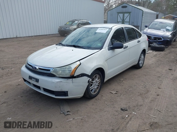 2011 Ford Focus SE with VIN 1FAHP3FN4BW199904, listed as a IAAI auction lot 41882463 with 109,798 mi miles. Bid and sale history available at carsss.com. Image 2.