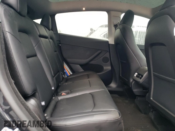 2025 Tesla Model Y Long Range z VIN 7SAYGDED9SF269767, wystawiony jako Copart lot #51588985 z przebiegiem 1 943 mil mil oraz Szkoda całkowita • Salvage title. Historia ofert i sprzedaży dostępna na DreamBid. Obrazek 10.
