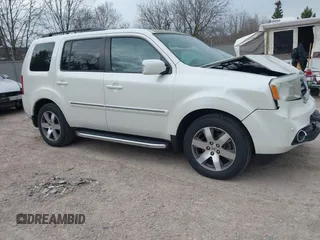 2014 Honda Pilot Touring with VIN 5FNYF4H91EB041614, listed as a IAAI auction lot 42050405 with 158,236 mi miles and . Bid and sale history available at carsss.com. Image 1.