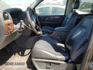 2006 GMC Envoy XL Denali with VIN 1GKET66M566114516, listed as a Copart auction lot 68332374 with 186,959 mi miles and Salvage Title. Bid and sale history available at carsss.com. Image 7.