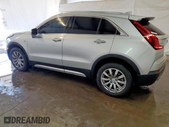 2022 Cadillac XT4 FWD Premium Luxury with VIN 1GYFZCR47NF100232, listed as a Copart auction lot 54520405 with 68,819 mi miles and Clean title. Bid and sale history available at DreamBid. Image 2.