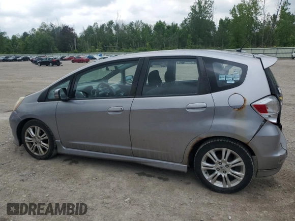 2009 Honda Fit Sport with VIN JHMGE88469S064405, listed as a Copart auction lot 61413745 with 179,497 mi miles and Salvage title. Bid and sale history available at DreamBid. Image 2.