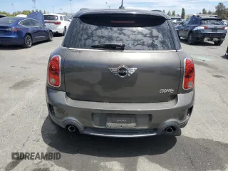 2011 MINI Countryman S with VIN WMWZC5C5XBWL55516, listed as a Copart auction lot 63239235 with 137,545 mi miles and Salvage title. Bid and sale history available at DreamBid. Image 6.