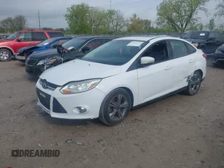 2014 Ford Focus SE with VIN 1FADP3F29EL353274, listed as a IAAI auction lot 42114579 with 140,937 mi miles and . Bid and sale history available at carsss.com. Image 2.