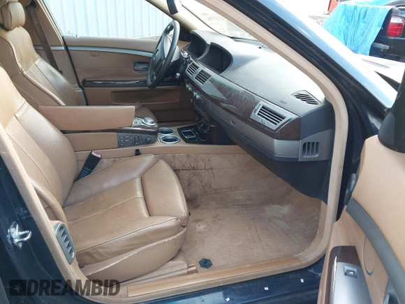 2008 BMW 7 Series 750i with VIN WBAHL83548DT14414, listed as a IAAI auction lot 41385596 with 153,303 mi miles and . Bid and sale history available at DreamBid. Image 5.