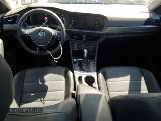 2021 Volkswagen Jetta SEL with VIN 3VWE57BU6MM052524, listed as a Copart auction lot 55524055 with 64,748 mi miles and Salvage title. Bid and sale history available at DreamBid. Image 8.