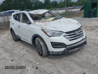2014 Hyundai Santa Fe with VIN 5XYZT3LB6EG223450, listed as a IAAI auction lot 42698337 with Not provided miles and . Bid and sale history available at DreamBid. Image 1.