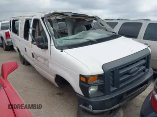 2014 Ford Econoline Wagon XL with VIN 1FBSS3BLXEDA71562, listed as a IAAI auction lot 41864794 with 140,942 mi miles. Bid and sale history available at carsss.com. Image 1.
