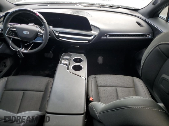 2024 Cadillac LYRIQ Sport z VIN 1GYKPWRK3RZ126481, wystawiony jako Copart lot #49578335 z przebiegiem 3 553 mil mil oraz Czysty tytuł • Clean title. Historia ofert i sprzedaży dostępna na DreamBid. Obrazek 8.