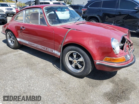 1969 Porsche 911 with VIN 119200792, listed as a Copart auction lot 49263235 with 9,446 mi miles and Salvage title. Bid and sale history available at DreamBid. Image 4.