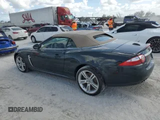 2007 Jaguar XK with VIN SAJWA44C779B12243, listed as a Copart auction lot 77239534 with 0 mi miles and Salvage Title. Bid and sale history available at carsss.com. Image 2.