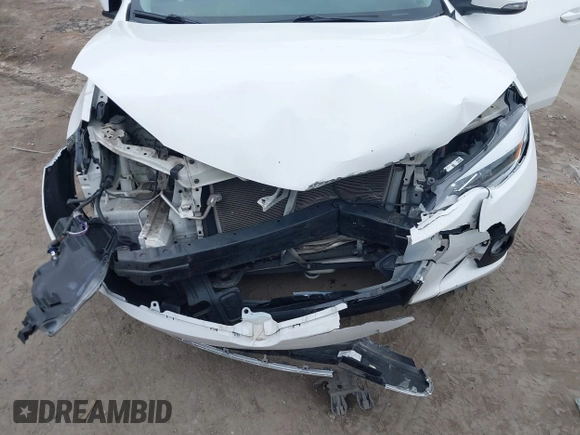2016 Toyota Corolla L with VIN 2T1BURHE5GC644191, listed as a IAAI auction lot 41523018 with 153,392 mi miles and . Bid and sale history available at DreamBid. Image 12.
