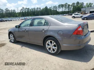 2012 Ford Fusion SE z VIN 3FAHP0HA0CR328833, wystawiony jako Copart lot #57631955 z przebiegiem 94 613 mil mil oraz Szkoda całkowita • Salvage title. Historia ofert i sprzedaży dostępna na DreamBid. Obrazek 2.
