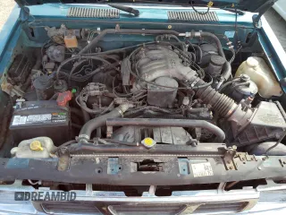 1995 Nissan Frontier XE z VIN 1N6HD16S3SC463075, wystawiony jako Copart lot #76235934 z przebiegiem 122 466 mil mil oraz Szkoda całkowita • Salvage title. Historia ofert i sprzedaży dostępna na DreamBid. Obrazek 11.