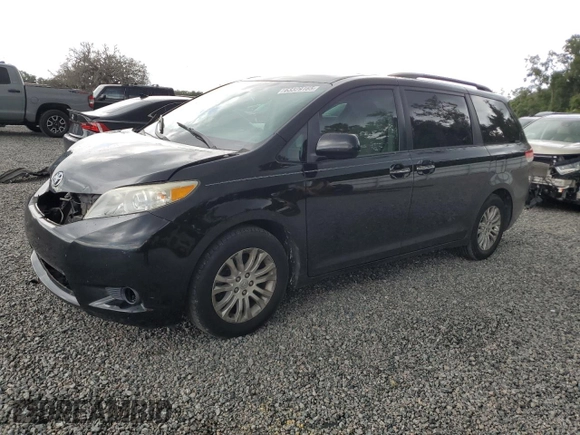 2012 Toyota Sienna XLE AAS with VIN 5TDYK3DC1CS279236, listed as a Copart auction lot 63329165 with 143,937 mi miles and Salvage title. Bid and sale history available at DreamBid. Image 1.
