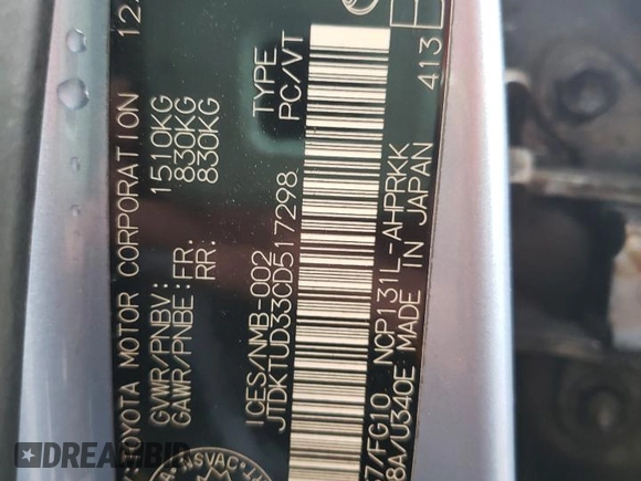 2012 Toyota Yaris L with VIN JTDKTUD33CD517298, listed as a Copart auction lot 52099335 with Not Provided miles and Salvage Title. Bid and sale history available at DreamBid. Image 13.