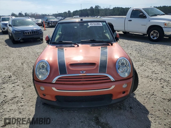 2006 MINI Convertible S with VIN WMWRH33576TF89127, listed as a Copart auction lot 49763365 with 150,446 mi miles and Salvage title. Bid and sale history available at DreamBid. Image 5.