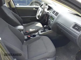 2014 Volkswagen Jetta S with VIN 3VW2K7AJ2EM352047, listed as a IAAI auction lot 42556420 with 104,798 mi miles and . Bid and sale history available at DreamBid. Image 5.