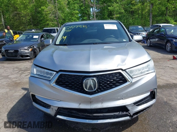 2018 Acura MDX Technology with VIN 5J8YD4H57JL003610, listed as a IAAI auction lot 42127585 with 82,633 mi miles and . Bid and sale history available at DreamBid. Image 12.
