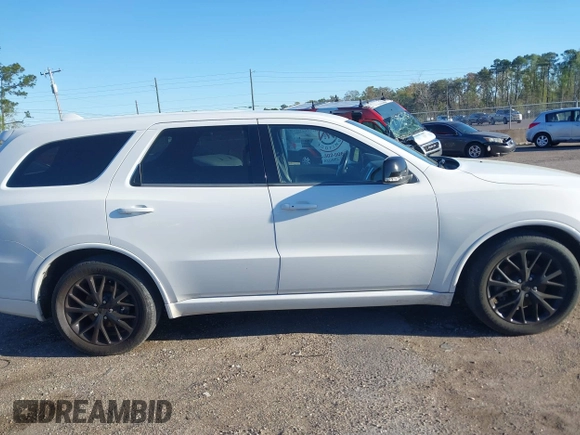 2015 Dodge Durango R/T with VIN 1C4SDHCT7FC873768, listed as a IAAI auction lot 41814710 with 130,237 mi miles and . Bid and sale history available at DreamBid. Image 13.