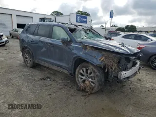 2024 Toyota Highlander XLE with VIN 5TDAAAB59RS001075, listed as a Copart auction lot 56958835 with 35,970 mi miles and Salvage title. Bid and sale history available at DreamBid. Image 4.