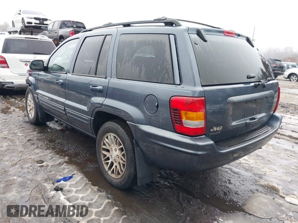 2004 Jeep Grand Cherokee Limited with VIN 1J8GW58J14C139431, listed as a IAAI auction lot 41519523 with 130,398 mi miles and . Bid and sale history available at DreamBid. Image 3.