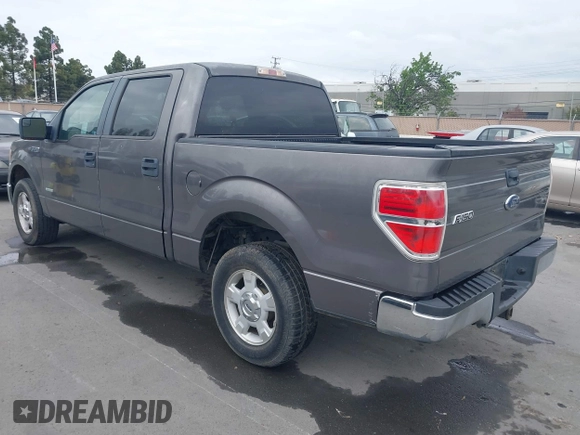 2011 Ford F-150 XLT with VIN 1FTFW1CT8BKD21411, listed as a IAAI auction lot 42077959 with 152,665 mi miles. Bid and sale history available at carsss.com. Image 3.
