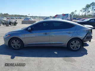 2018 Hyundai Elantra SEL z VIN 5NPD84LF5JH336295, wystawiony jako IAAI lot #41786963 z przebiegiem 96 399 mil mil oraz . Historia ofert i sprzedaży dostępna na DreamBid. Obrazek 14.