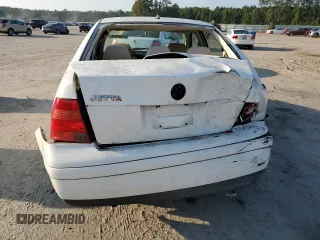 1999 Volkswagen Jetta GL z VIN 3VWRA29M5XM058261, wystawiony jako Copart lot #74589844 z przebiegiem 167 384 mil mil oraz Szkoda całkowita • Salvage title. Historia ofert i sprzedaży dostępna na DreamBid. Obrazek 6.