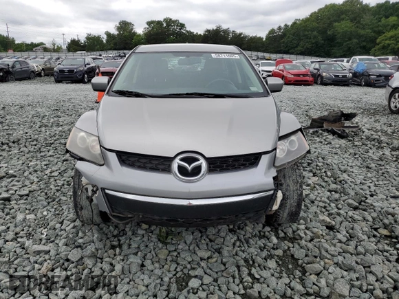 2010 Mazda CX-7 SV z VIN JM3ER2W53A0301123, wystawiony jako Copart lot #58711605 z przebiegiem 236 428 mil mil oraz Szkoda całkowita • Salvage title. Historia ofert i sprzedaży dostępna na DreamBid. Obrazek 5.