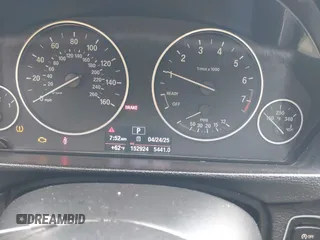 2014 BMW 3 Series 320i with VIN WBA3B1G57ENS80800, listed as a IAAI auction lot 42097683 with 152,924 mi miles. Bid and sale history available at carsss.com. Image 7.