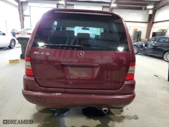 1999 Mercedes-Benz M-Class with VIN 4JGAB72EXXA082657, listed as a Copart auction lot 71366544 with 113,918 mi miles and Clean Title. Bid and sale history available at carsss.com. Image 6.