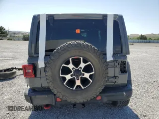 2020 Jeep Wrangler Unlimited Rubicon with VIN 1C4HJXFG4LW334160, listed as a Copart auction lot 59486435 with Not provided miles and Salvage title. Bid and sale history available at DreamBid. Image 6.