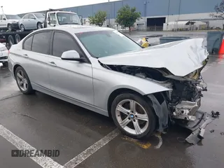 2013 BMW 3 Series 328i with VIN WBA3C1G59DNN93746, listed as a IAAI auction lot 41527720 with 215,442 mi miles. Bid and sale history available at carsss.com. Image 1.