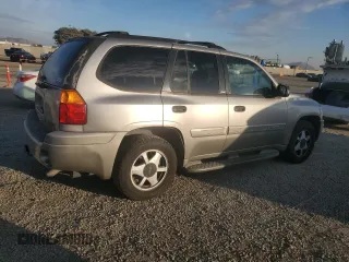 2002 GMC Envoy SLT with VIN 1GKDS13S922287249, listed as a Copart auction lot 88049875 with 157,485 mi miles and Salvage Title. Bid and sale history available at carsss.com. Image 3.