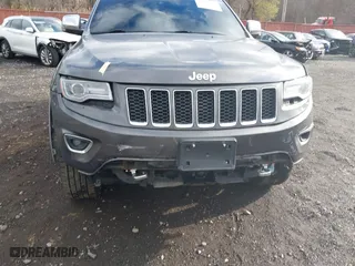 2014 Jeep Grand Cherokee Overland with VIN 1C4RJFCG5EC329377, listed as a IAAI auction lot 40822324 with 106,222 mi miles. Bid and sale history available at carsss.com. Image 6.