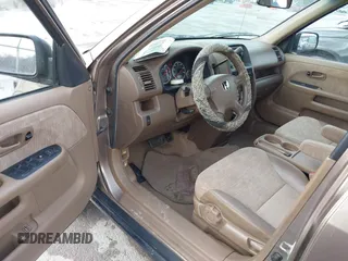 2004 Honda CR-V LX with VIN JHLRD78454C024250, listed as a IAAI auction lot 41227320 with 317,109 mi miles and . Bid and sale history available at carsss.com. Image 14.
