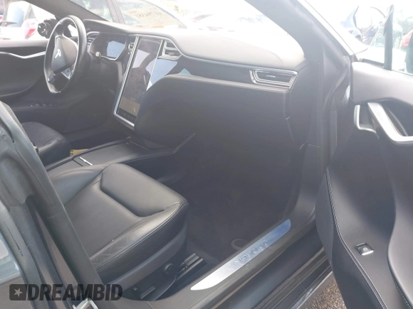 2016 Tesla Model S 70 with VIN 5YJSA1E14GF157118, listed as a IAAI auction lot 41794381 with 53,651 mi miles and . Bid and sale history available at DreamBid. Image 5.