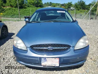 2001 Ford Taurus SE with VIN 1FAFP53U61A161763, listed as a Copart auction lot 43317165 with 64,025 mi miles and Salvage title. Bid and sale history available at DreamBid. Image 5.