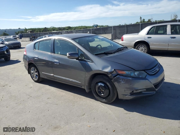 2011 Honda Insight EX with VIN JHMZE2H73BS012509, listed as a Copart auction lot 52590455 with 141,500 mi miles and Salvage Title. Bid and sale history available at carsss.com. Image 4.
